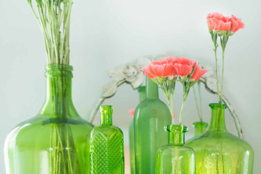 Repurpose vases and bottles to add to your home decor.