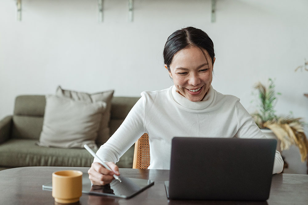 Woman sitting at a computer